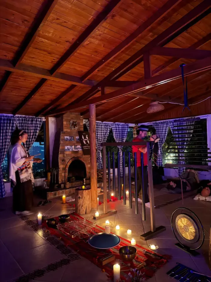 Harmonica Ayahuasca Retreat Colombia Candles and gong The ceremony room set with candles and a gong for the evening