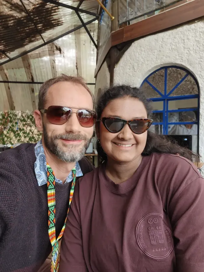 Harmonica Ayahuasca Retreat Colombia Sunny selfie together Two friends in sunglasses smiling for a selfie at the house